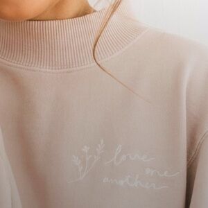 Elegant Mock Turtleneck Sweatshirt in Soft Pink “Love One Another” Embroidery
